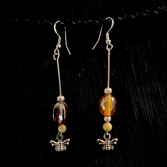Amber colored bead w/ bees