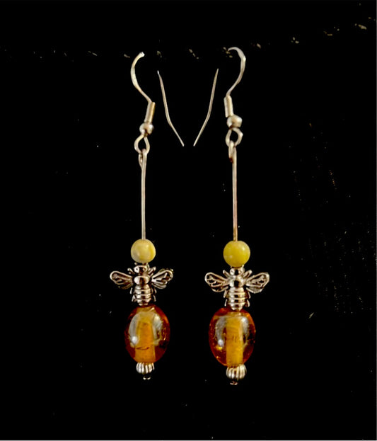 Amber colored beads with bees